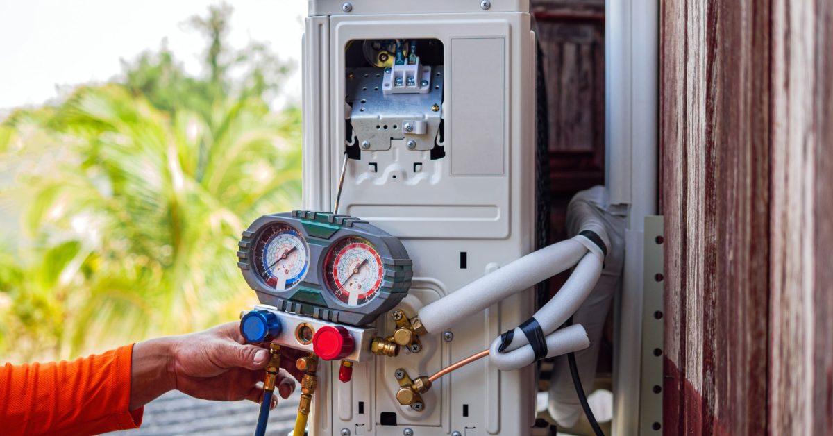 air-conditioning-technicians-install-new-compressor-air_48924925